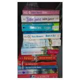 Covered Tote of Paperback, Hardcover Books.