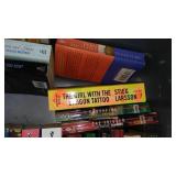 Covered Tote of Paperback, Hardcover Books.