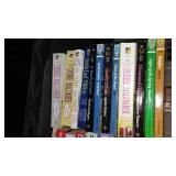 Covered Tote of Paperback, Hardcover Books.