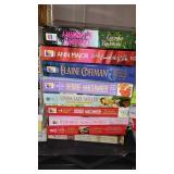 Covered Tote of Paperback, Hardcover Books.