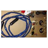 Vintage Costume Jewelry, Handheld Sewing machine and More.