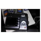 Kodak Easy Share Camera, Tri Pod, Video Camera, Portable DVD Player.