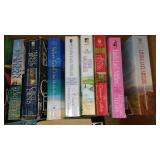 Covered Tote of Paperback, Hardcover Books.