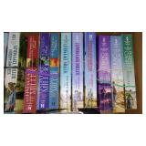 Covered Tote of Paperback, Hardcover Books.