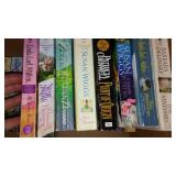 Covered Tote of Paperback, Hardcover Books.