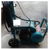 Makita Air Compressor 5 gal. 3 HP with Cart and Hose.