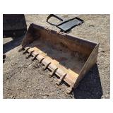 Bobcat Skid Steer Loader Bucket Attachment with Teeth approximately 72 inches wide Bobcat Skid Steer Loader Bucket Attachment with Teeth approximately 72 inches wide