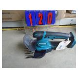 Makita 18 volt grass trimmer. Trade show display. Makita 18 volt grass trimmer. Trade show display.