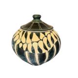 Artisan Crafted Lidded Pottery Jar with Blue and Cream Design, 7 Inches Tall