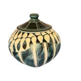 Artisan Crafted Lidded Pottery Jar with Blue and Cream Design, 7 Inches Tall