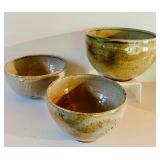 Handcrafted Pottery Collection Including Bowls, Mug, and Vase