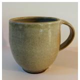 Handcrafted Pottery Collection Including Bowls, Mug, and Vase