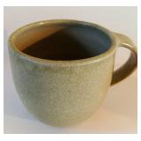 Handcrafted Pottery Collection Including Bowls, Mug, and Vase