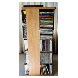 Rotating Media Storage Tower with Assorted CDs and Box Sets