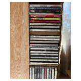 Rotating Media Storage Tower with Assorted CDs and Box Sets