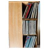 Rotating Media Storage Tower with Assorted CDs and Box Sets