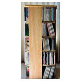 Rotating Media Storage Tower with Assorted CDs and Box Sets