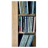 Rotating Media Storage Tower with Assorted CDs and Box Sets