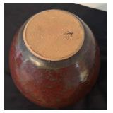 Artisan Crafted Pottery Jar with Red Glaze