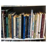 Collection of Fly Fishing and Trout Fishing Books with Bookshelf