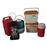 Lantern, Coolers and Water Jugs by Coleman and Igloo