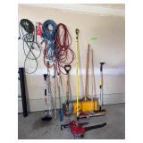 Garage Utility Lot - Leaf blower, shovels, extension cords Garage Utility Lot - Leaf blower, shovels, extension cords