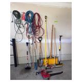 Garage Utility Lot - Leaf blower, shovels, extension cords Garage Utility Lot - Leaf blower, shovels, extension cords