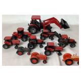 Collection of Miniature Case Tractors and Equipment
