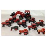 Collection of Miniature Case Tractors and Equipment