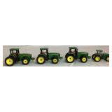 Large Collection of John Deere 1/64 Miniature Tractors and Implements