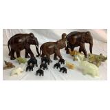 Collection of Wood, Oyster Shell, and Stone Handcarved Elephants- 18 Pieces Total Collection of Wood, Oyster Shell, and Stone Handcarved Elephants- 18 Pieces Total