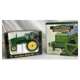 1/16 Pair of John Deere Collectables: Model HN Collectors Edition ERTL #15033A and Battery Operated Model E Engine 1/16 Pair of John Deere Collectables: Model HN Collectors Edition ERTL #15033A and Battery Operated Model E Engine