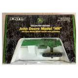 1/16 Pair of John Deere Collectables: Model HN Collectors Edition ERTL #15033A and Battery Operated Model E Engine 1/16 Pair of John Deere Collectables: Model HN Collectors Edition ERTL #15033A and Battery Operated Model E Engine