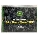 1/16 Pair of John Deere Collectables: Model HN Collectors Edition ERTL #15033A and Battery Operated Model E Engine 1/16 Pair of John Deere Collectables: Model HN Collectors Edition ERTL #15033A and Battery Operated Model E Engine