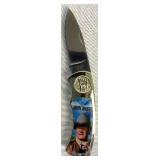 Collection of 6 John Wayne Commemerative Knife Sets and 1 Cowboy Knife Collection of 6 John Wayne Commemerative Knife Sets and 1 Cowboy Knife