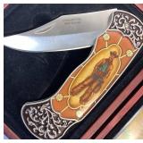 Collection of 6 John Wayne Commemerative Knife Sets and 1 Cowboy Knife Collection of 6 John Wayne Commemerative Knife Sets and 1 Cowboy Knife