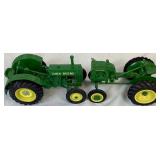 1/16 Pair of John Deere Die-Cast Metal Tractors: 1935 Model BR ERTL #2778 and ERTL Toy Tractor Times 1990 Anniversary Model A Tractor 1/16 Pair of John Deere Die-Cast Metal Tractors: 1935 Model BR ERTL #2778 and ERTL Toy Tractor Times 1990 Anniversary Model A Tractor