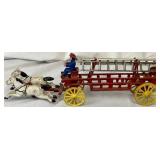 John Wright Cast Iron Horse-Drawn Fire Truck with 2 Ladders and 1 Driver (14.5"L x 5.25"H) John Wright Cast Iron Horse-Drawn Fire Truck with 2 Ladders and 1 Driver (14.5"L x 5.25"H)
