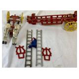 John Wright Cast Iron Horse-Drawn Fire Truck with 2 Ladders and 1 Driver (14.5"L x 5.25"H) John Wright Cast Iron Horse-Drawn Fire Truck with 2 Ladders and 1 Driver (14.5"L x 5.25"H)