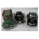 Assortment of 11 1:24 Scale Diecast Models plus 1:18 Scale PT Cruiser