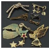 Collection of Gold & Silver Tone Pins and Clips Collection of Gold & Silver Tone Pins and Clips
