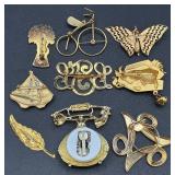 Collection of Gold & Silver Tone Pins and Clips Collection of Gold & Silver Tone Pins and Clips