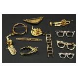 Collection of Gold & Silver Tone Pins and Clips Collection of Gold & Silver Tone Pins and Clips