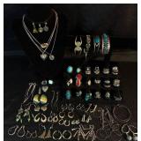 Large Assortment of Silver Tone Bracelets, Earrings and Rings