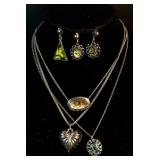 Large Assortment of Silver Tone Bracelets, Earrings and Rings