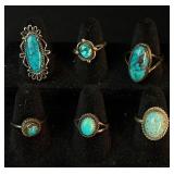 Large Assortment of Silver Tone Bracelets, Earrings and Rings