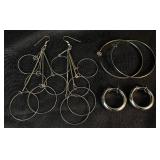 Large Assortment of Silver Tone Bracelets, Earrings and Rings