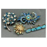 Assortment of Vintage Blue Accented Brooches, Necklaces, Earrings and Bracelets Assortment of Vintage Blue Accented Brooches, Necklaces, Earrings and Bracelets