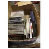 Collection of Vintage Vinyl Records, CDs, and 8 track Cassette Tapes