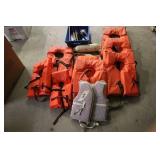 Lot of 6 Orange Life Jackets, 1 Adjustable Life Vest, and Fishing Accessories